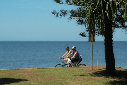 Riding bikes along the coast